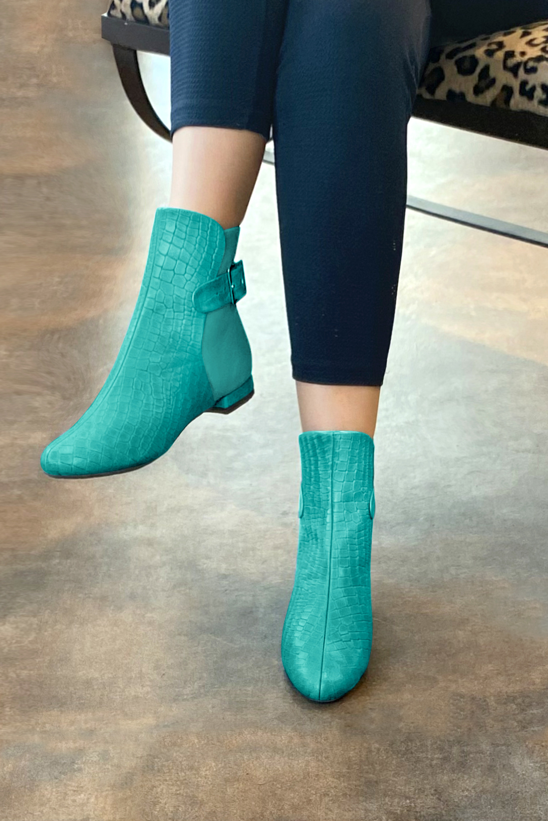 Aquamarine blue women's ankle boots with buckles at the back. Round toe. Flat block heels. Worn view - Florence KOOIJMAN